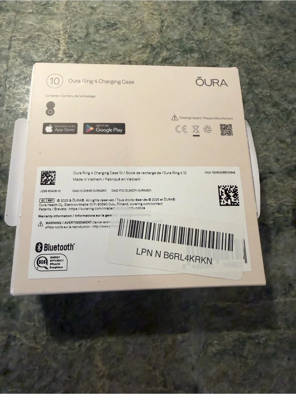 Oura Ring 4 portable charging case.